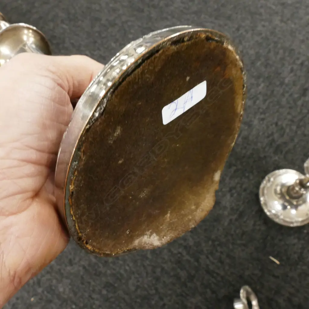 A pair of antique Old Sheffield Plate candlesticks Image 1++