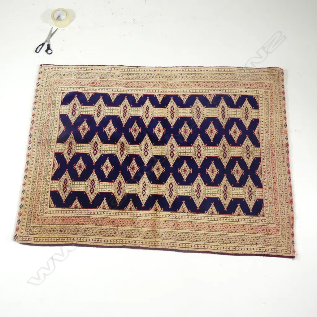 A Turkoman wool on cotton rug Image 1++