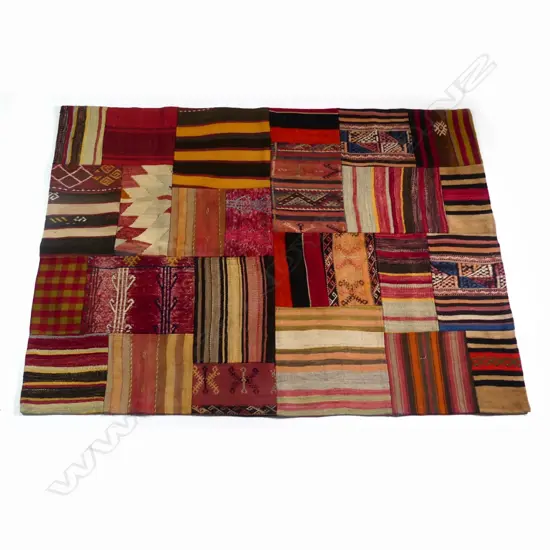 An unusual hand knotted Turkish patchwork kilim rug