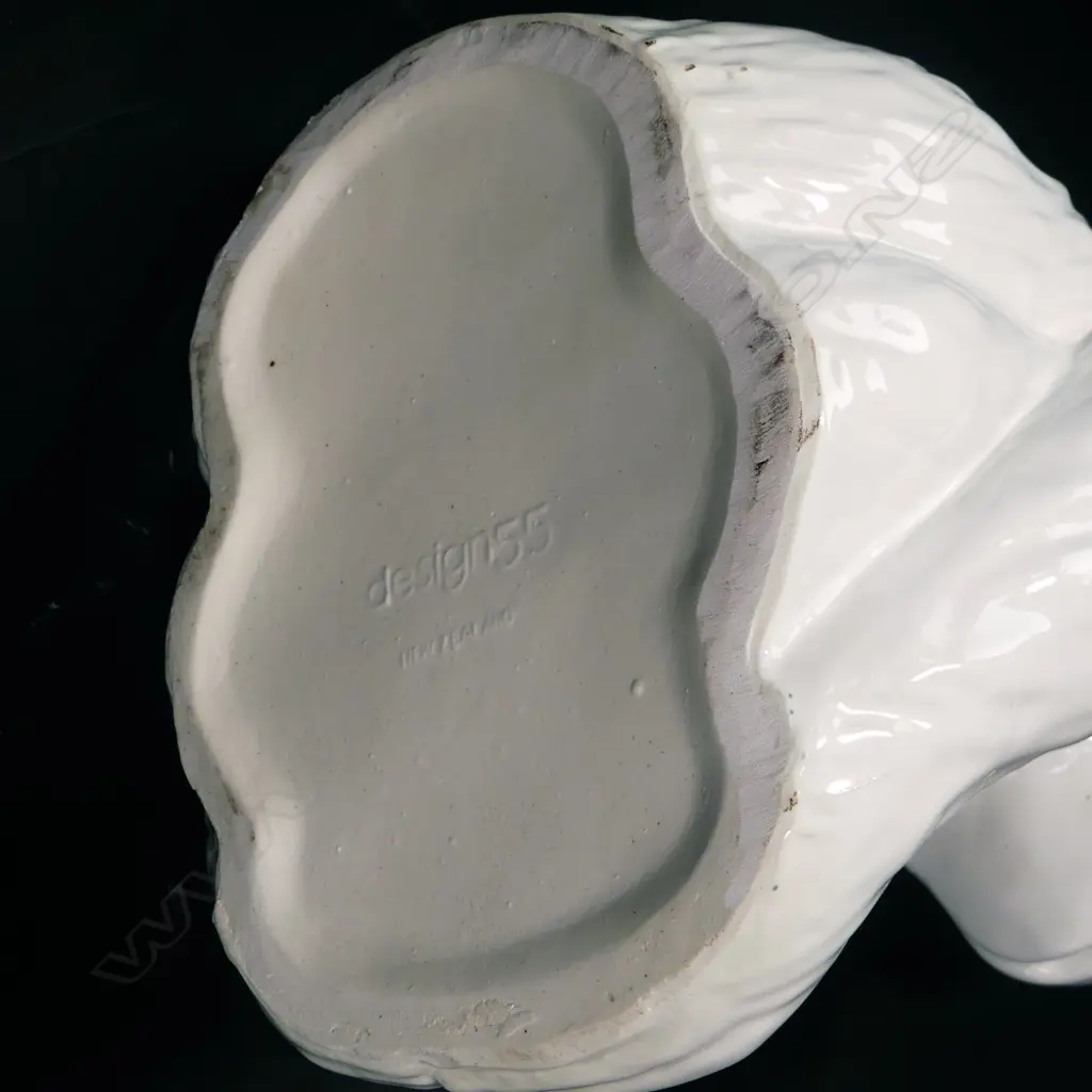 A modern white glazed ceramic walking stick stand modelled as a seated chimpanzee Image 1++