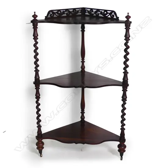 An early 19thC rosewood three tier corner whatnot