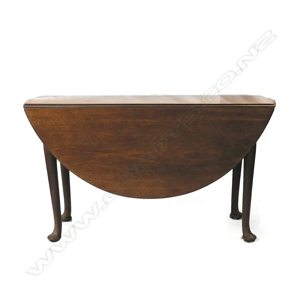 A George III mahogany drop-side dining table Image 1++