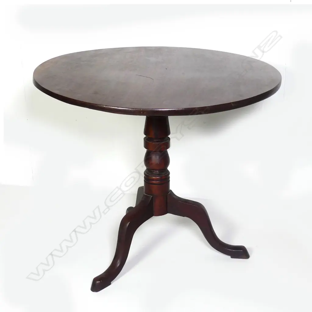 A Georgian mahogany tilt top wine table Image 1++