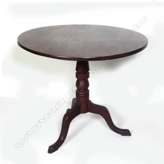 A Georgian mahogany tilt top wine table