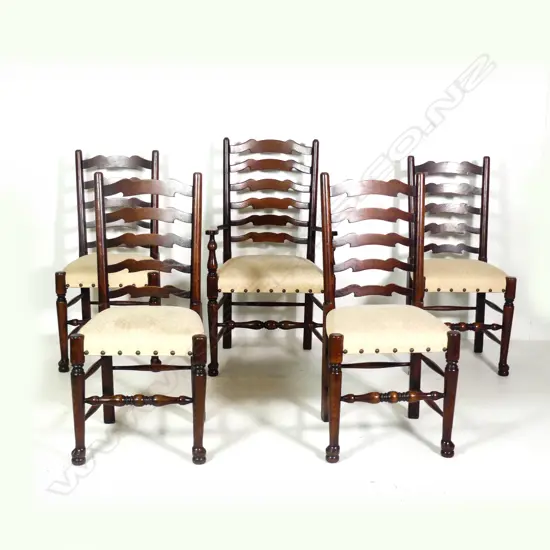 Five oak ladder back dining chairs