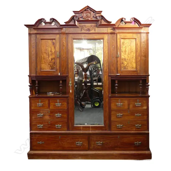 An impressive colonial mottled kauri Beaconsfield wardrobe