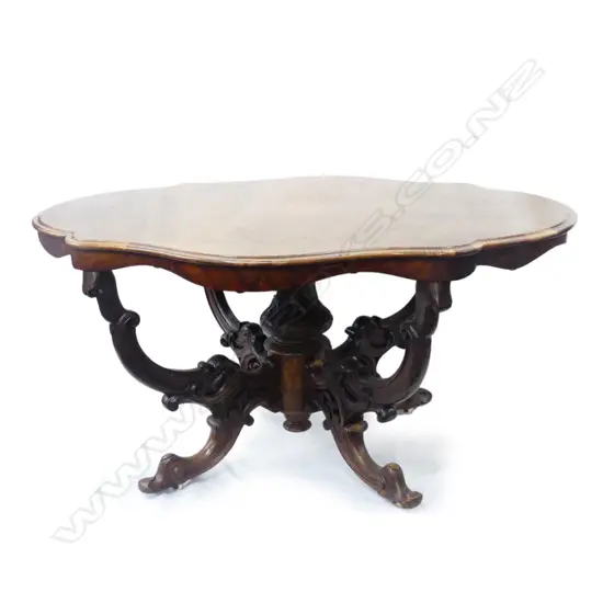 A Victorian walnut centre table