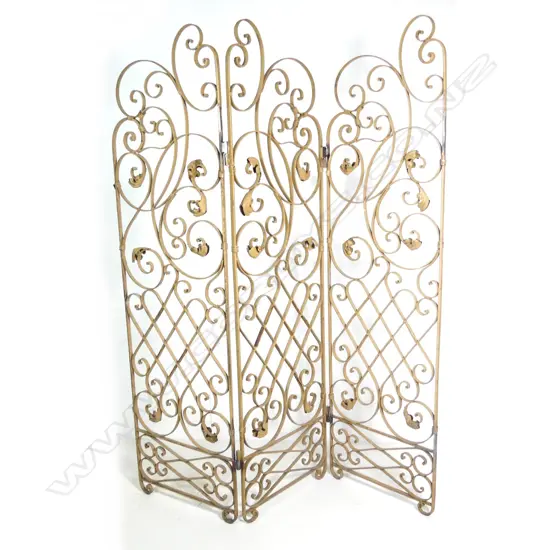 A vintage French wrought iron three fold screen