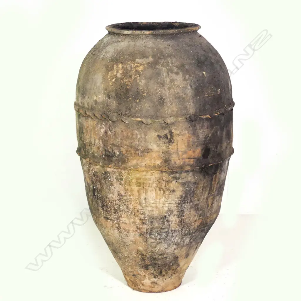 An old European terracotta tall olive oil storage jar Image 1++
