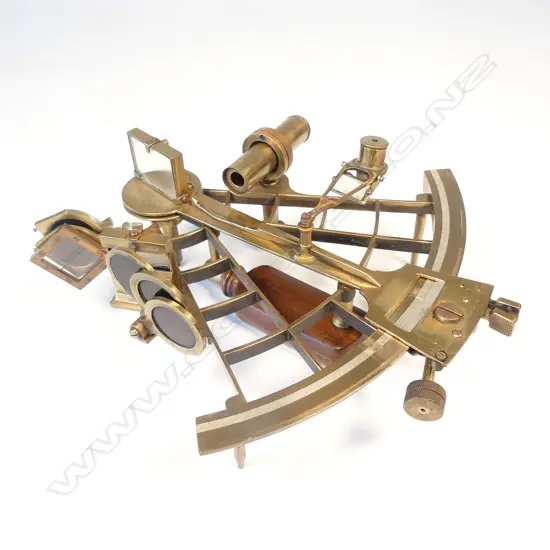 A brass sextant by Whyte Thompson & Co