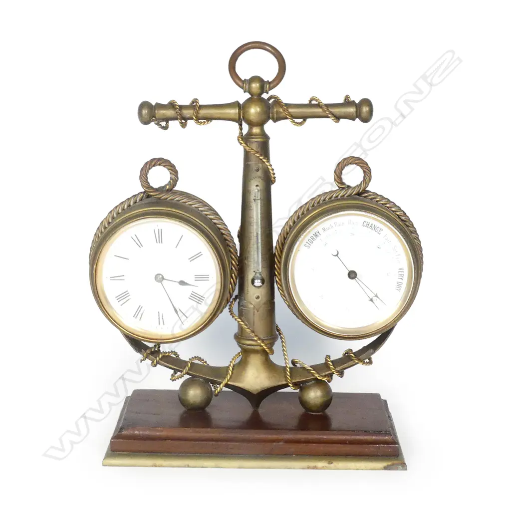 A nautical themed clock and barometer combination in brass Image 1++