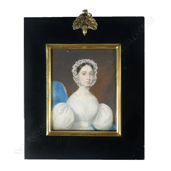 A George III hand painted portrait miniature of a young woman