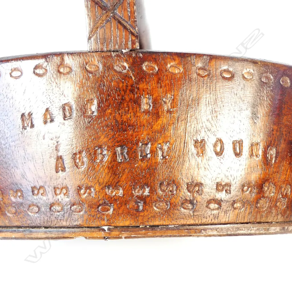 An uncommon vintage Pitcairn Island miro wood basket Image 1++