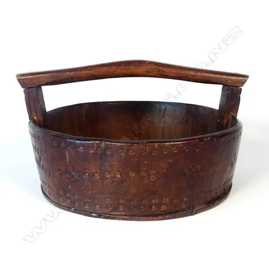 An uncommon vintage Pitcairn Island miro wood basket