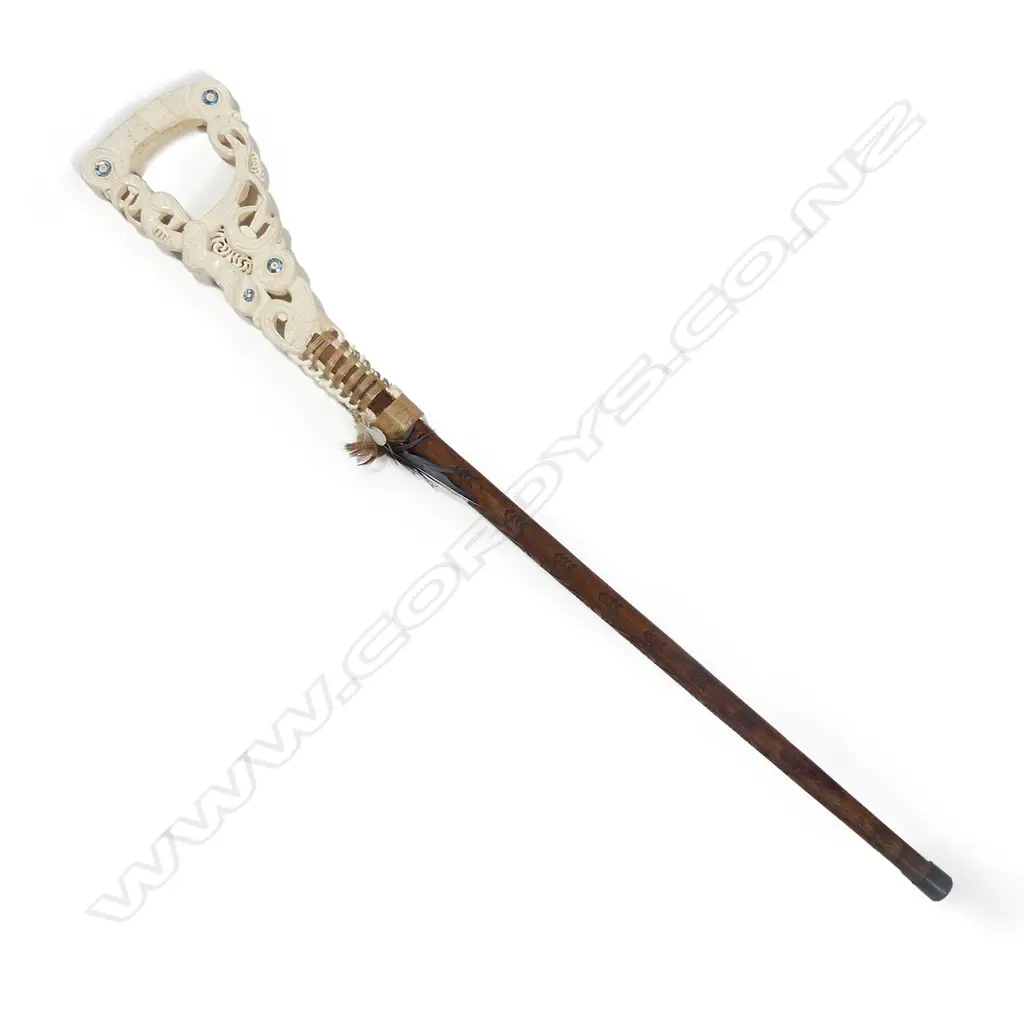 An elaborate Maori carved whalebone handled walking stick Image 1++