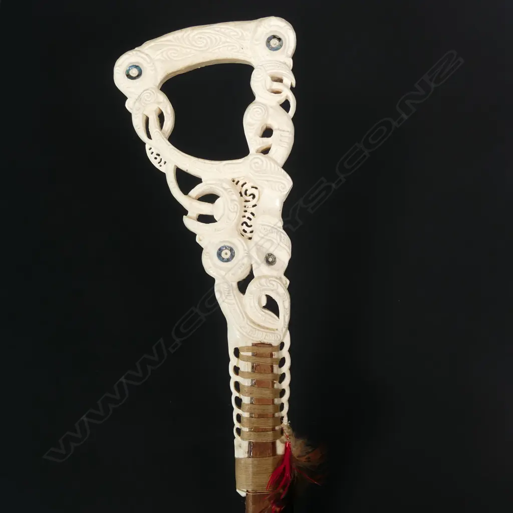 An elaborate Maori carved whalebone handled walking stick Image 1++