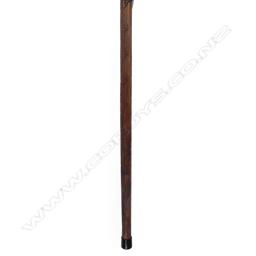 An elaborate Maori carved whalebone handled walking stick Image 1++