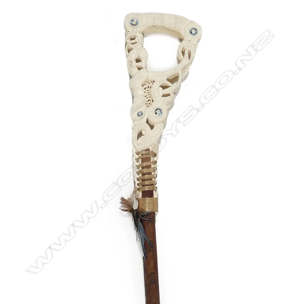 An elaborate Maori carved whalebone handled walking stick Image 1++