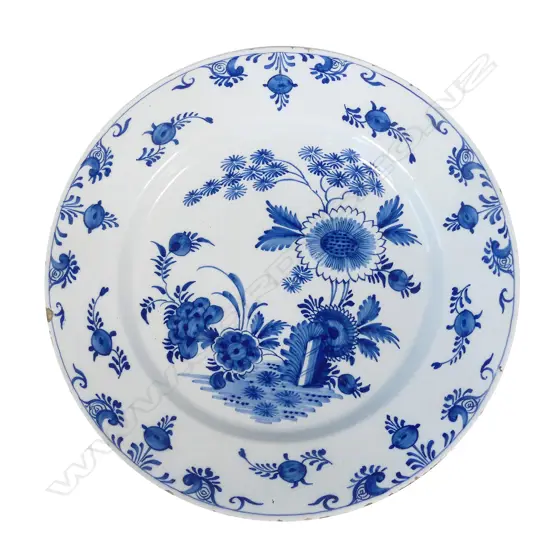 A large Delft blue and white tin glazed charger