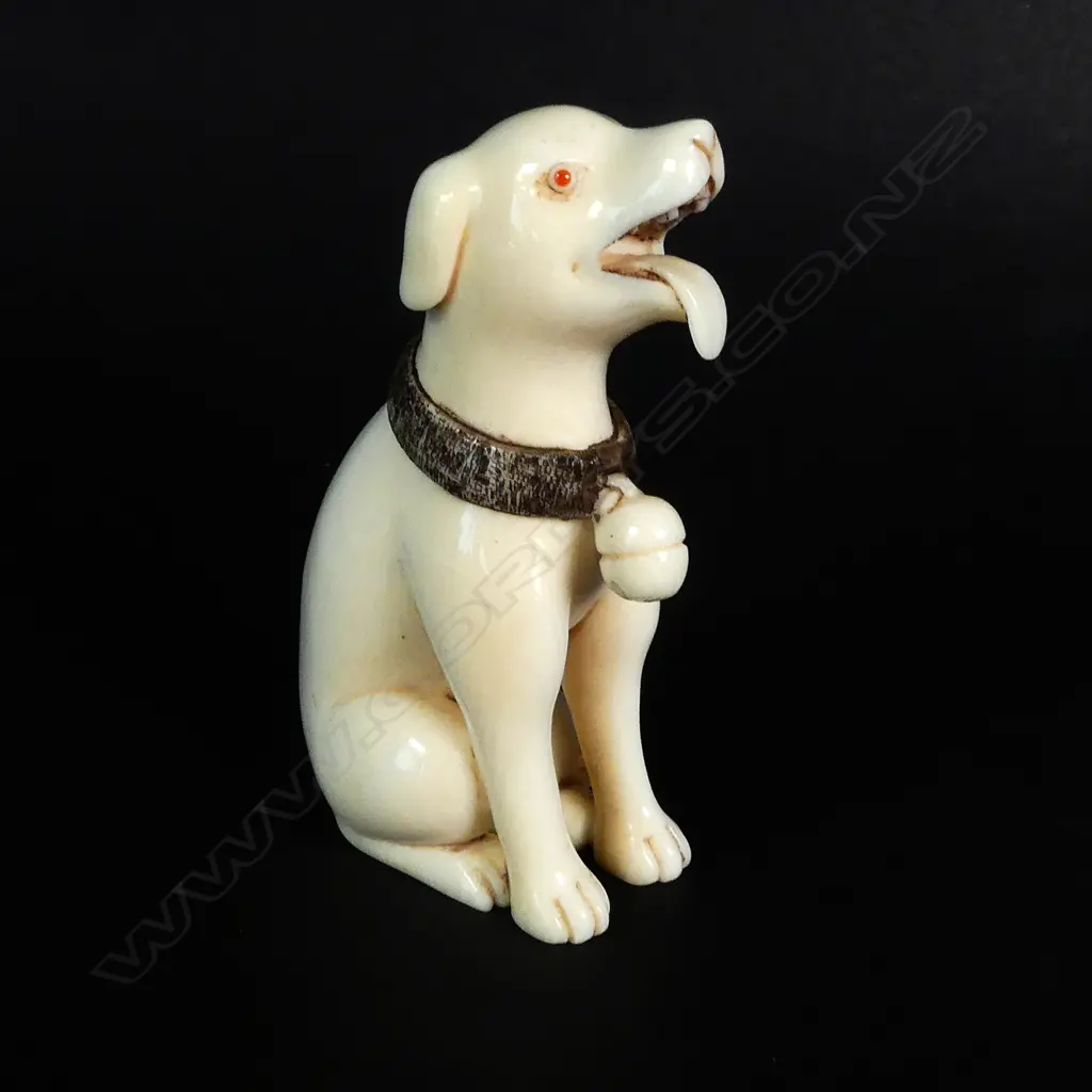 A Japanese Tokyo School ivory netsuke of a seated dog Image 1++