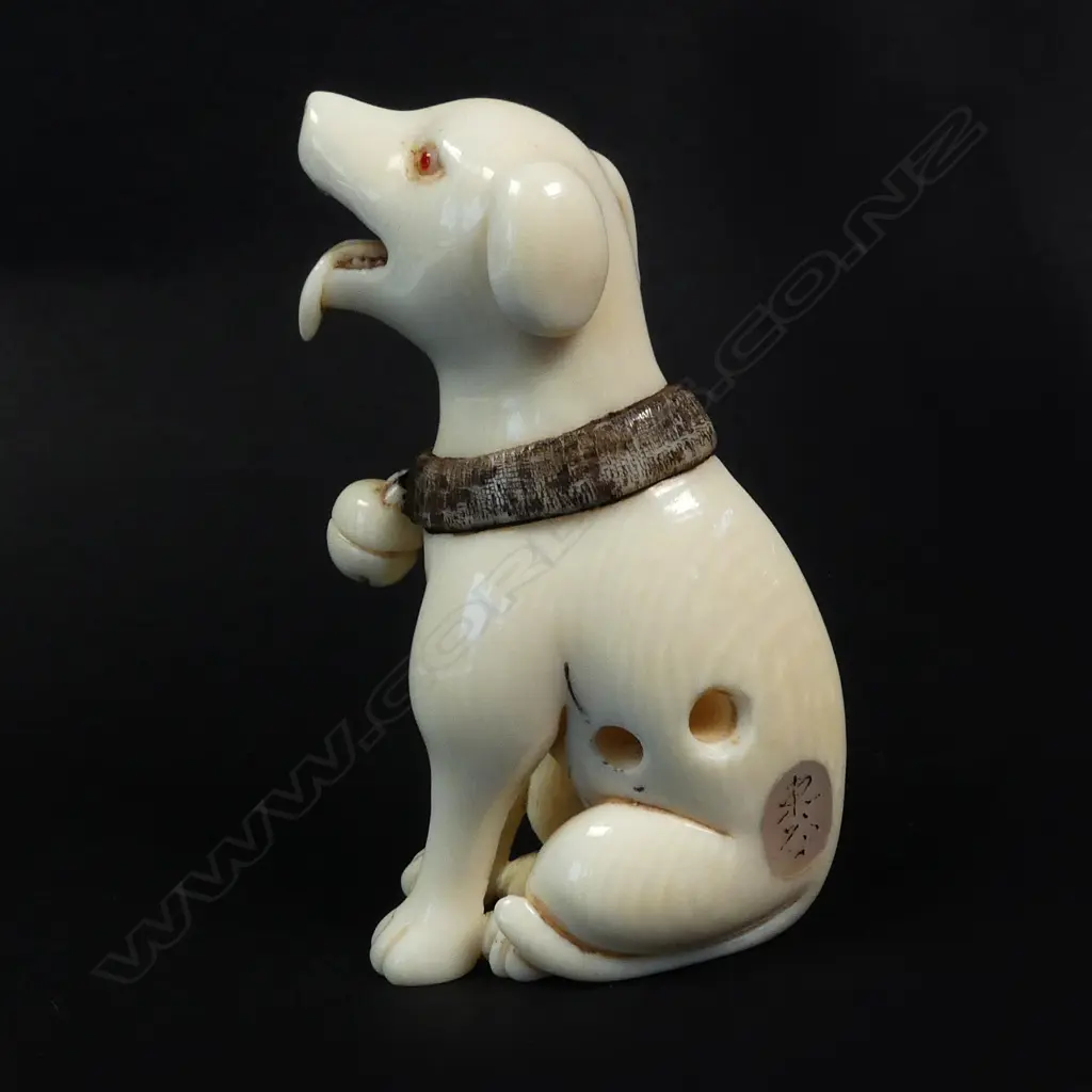 A Japanese Tokyo School ivory netsuke of a seated dog Image 1++