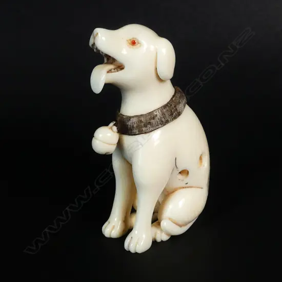 A Japanese Tokyo School ivory netsuke of a seated dog