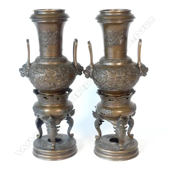 A pair of Japanese Meiji period bronze vases
