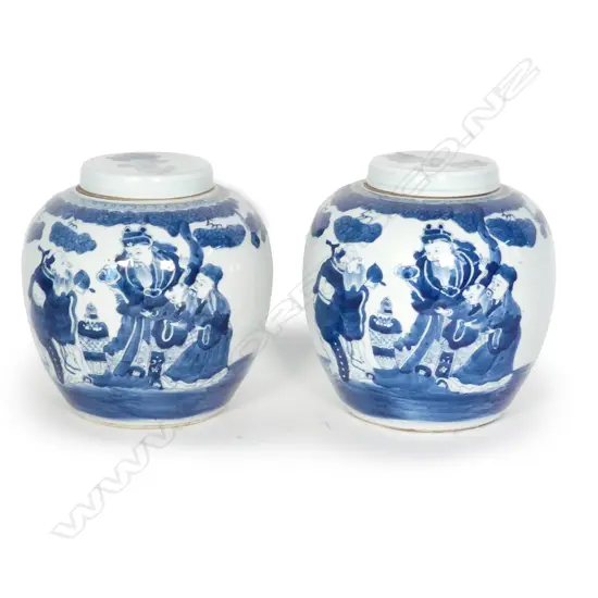 A pair of 19thC Chinese blue and white lidded ginger jars