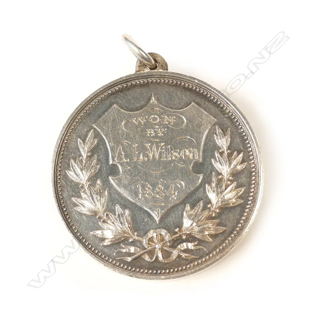 A 19thC Anton Teutenberg 1884 'The Auckland College and Grammar School' silver medallion Image 1++