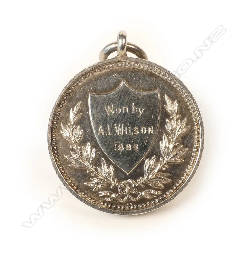 A 19thC Anton Teutenberg 1886 'The Auckland College and Grammar School' silver medallion Image 1++