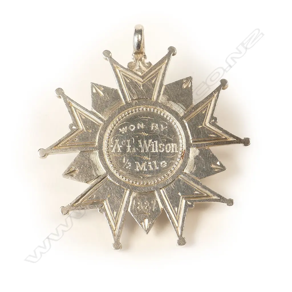 A 19thC Anton Teutenberg 1887 'J.B.R.C.' (Judges Bay Rowing Club) silver five point ball tipped star medallion Image 1++