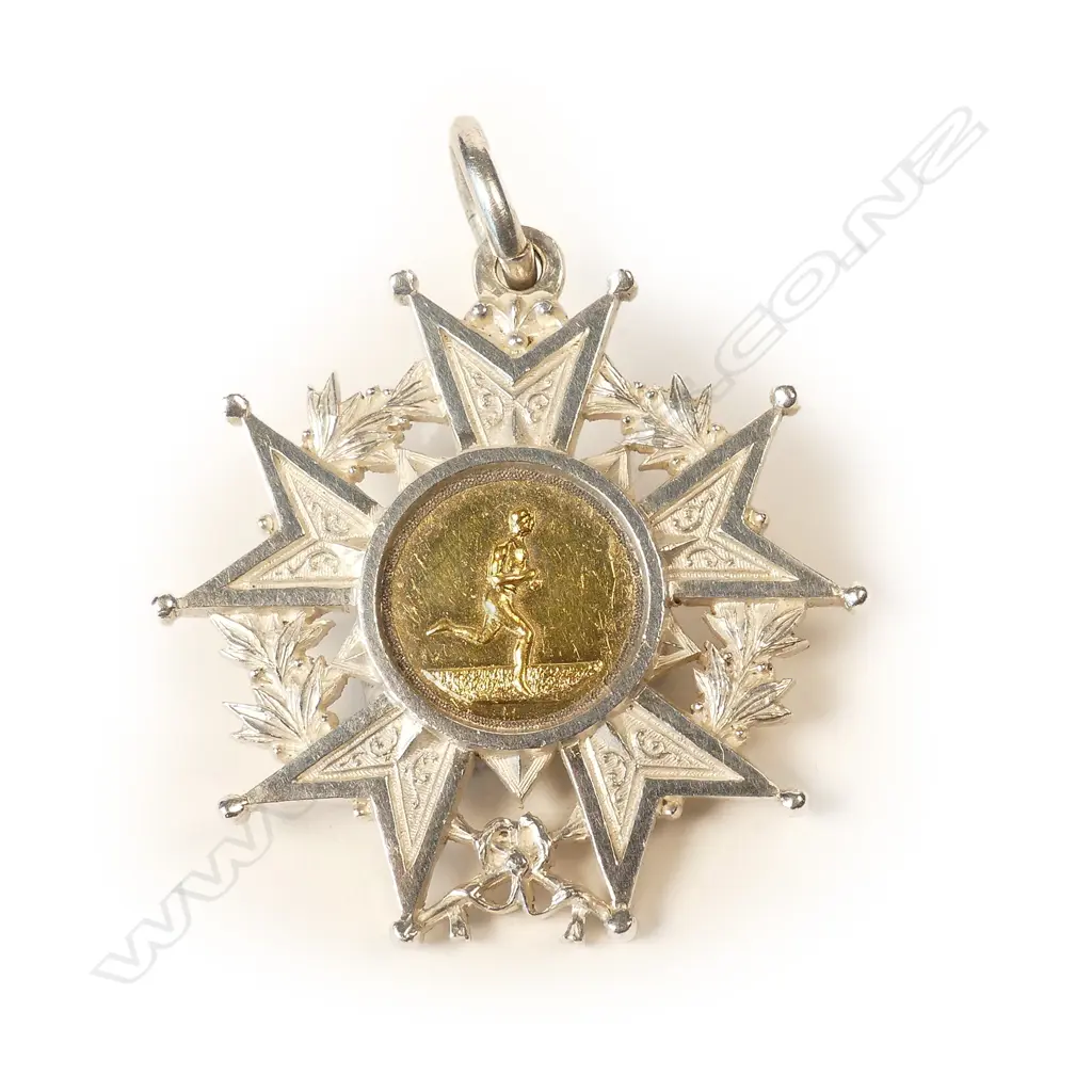 A 19thC Anton Teutenberg 1889 'Printer's Picnic' silver five point ball tipped star medallion Image 1++