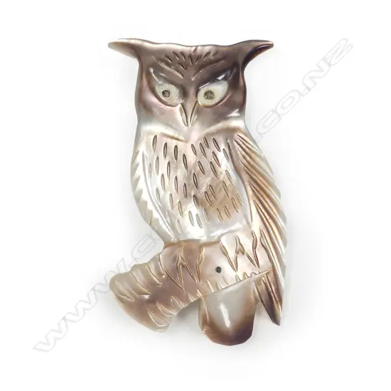 An uncommon Tony Buller owl carved mother-of-pearl brooch