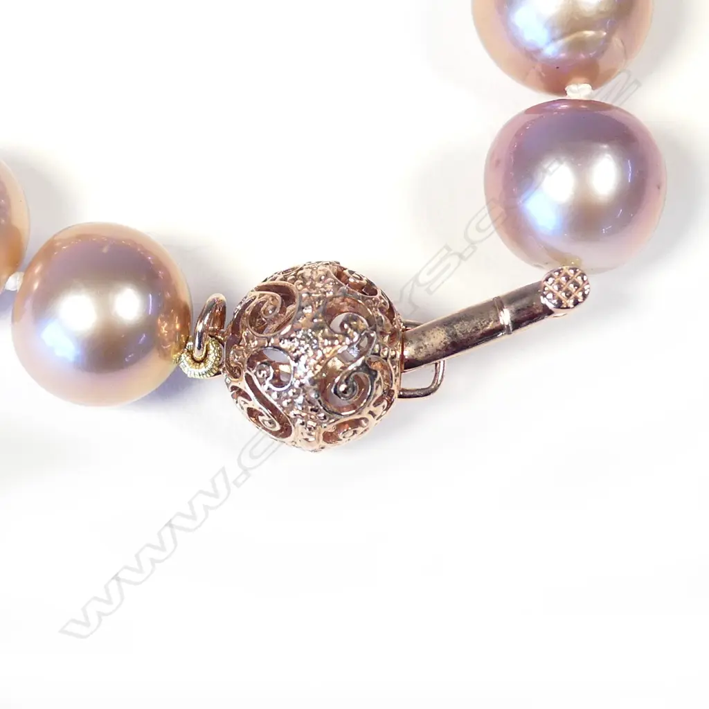 A cultured pearl necklace Image 1++
