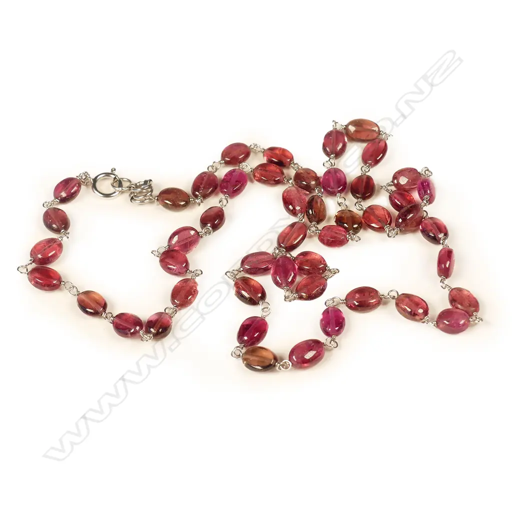 A 48 ruby bead and 18ct. white gold necklace Image 1++