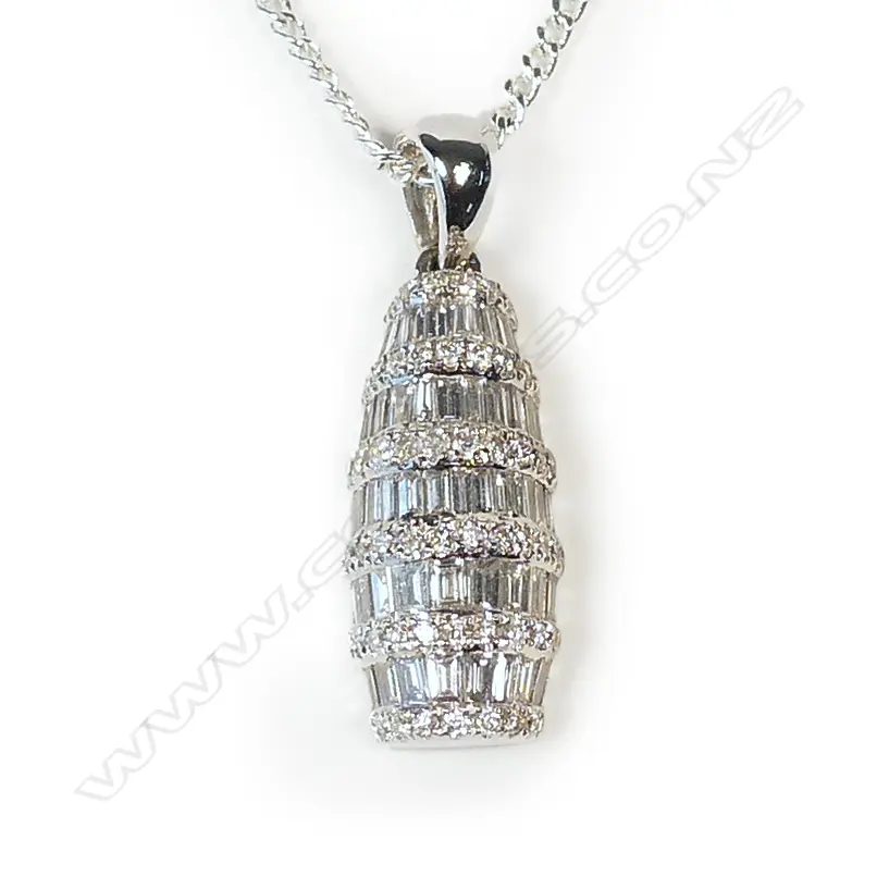 A modern 18ct. white gold diamond set pendant on chain Image 1++