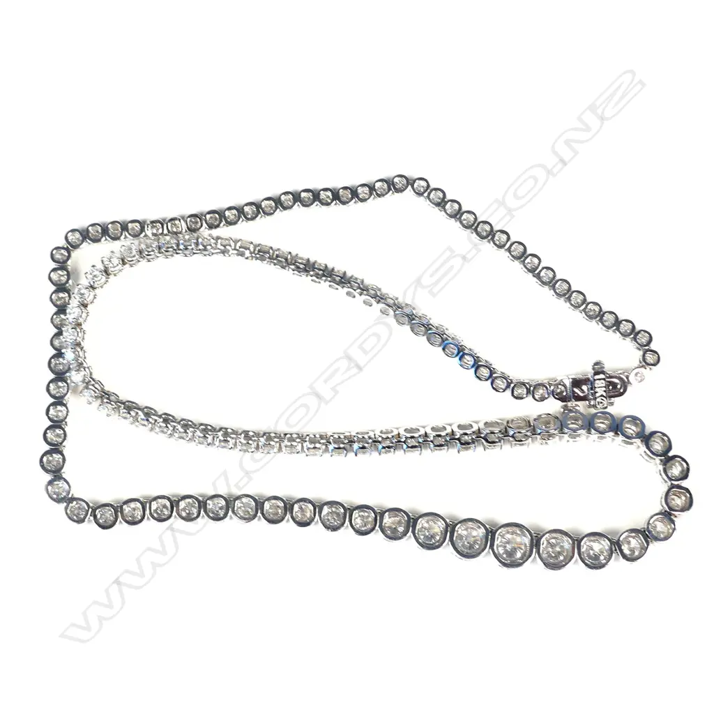 An impressive 18ct. white gold and graduated diamond set necklace Image 1++