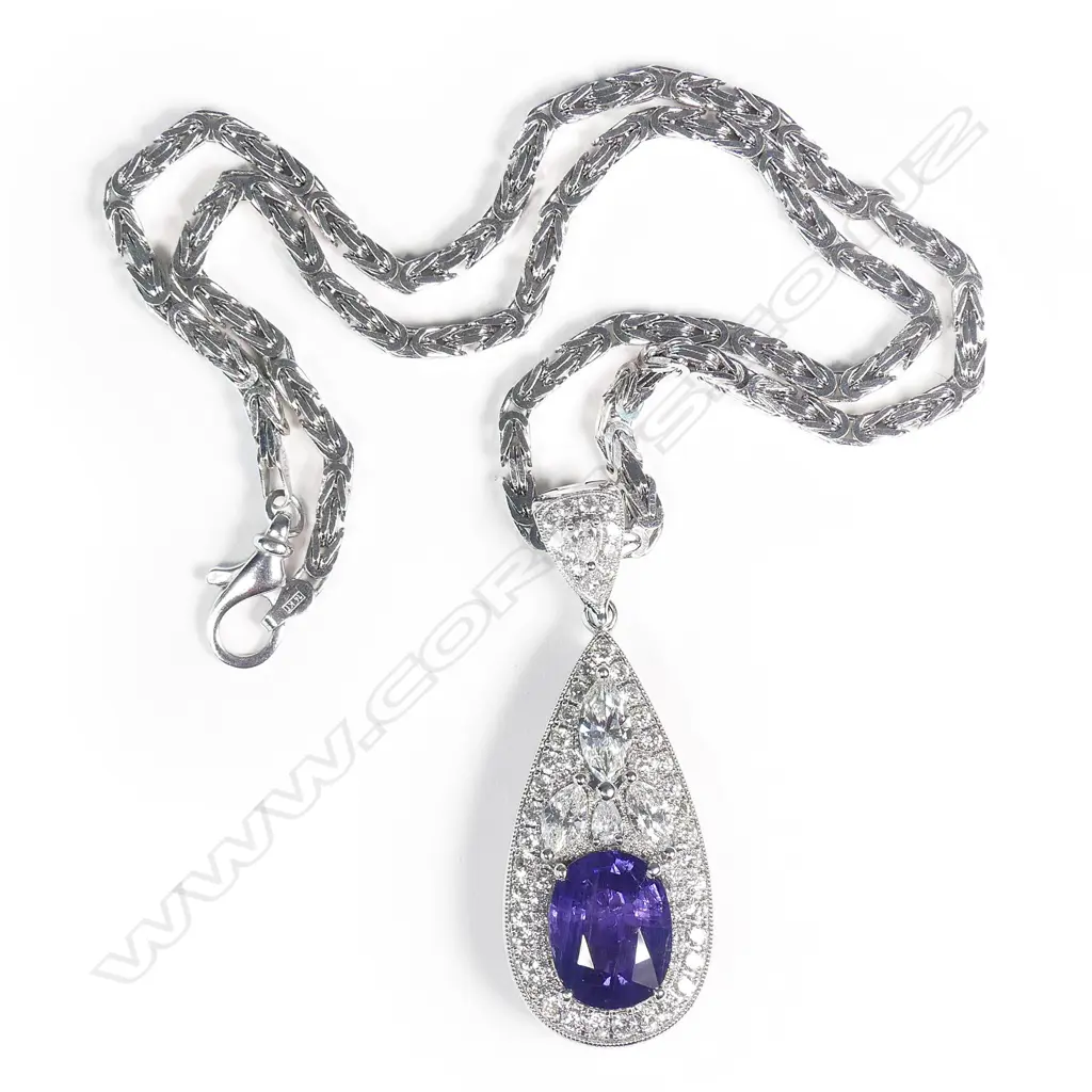 An exceptional 18ct white gold sapphire and diamond pendant Image 1++