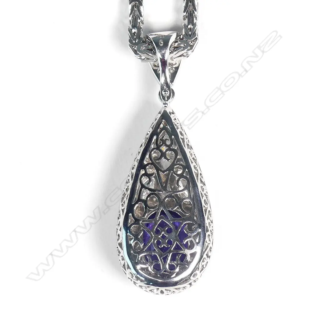 An exceptional 18ct white gold sapphire and diamond pendant Image 1++