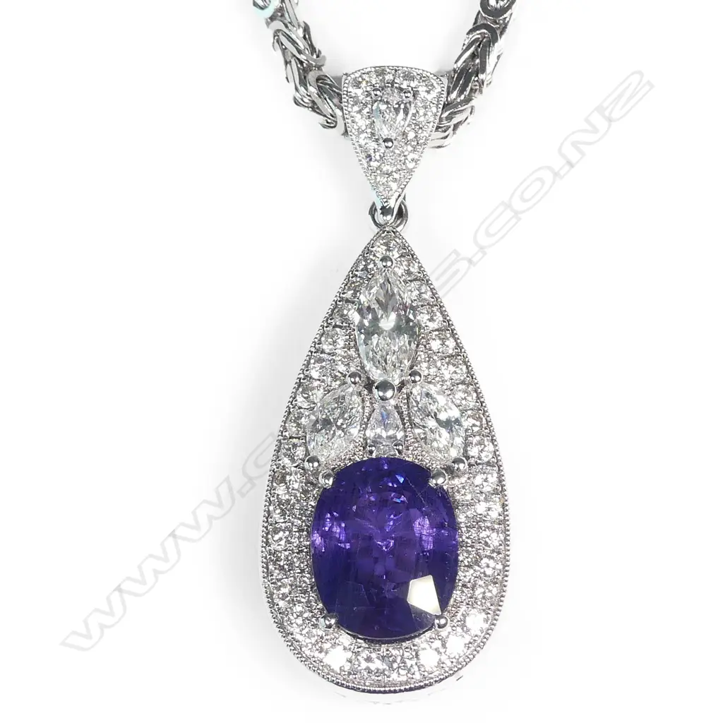 An exceptional 18ct white gold sapphire and diamond pendant Image 1++