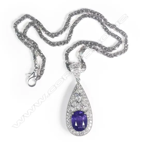 An exceptional 18ct white gold sapphire and diamond pendant