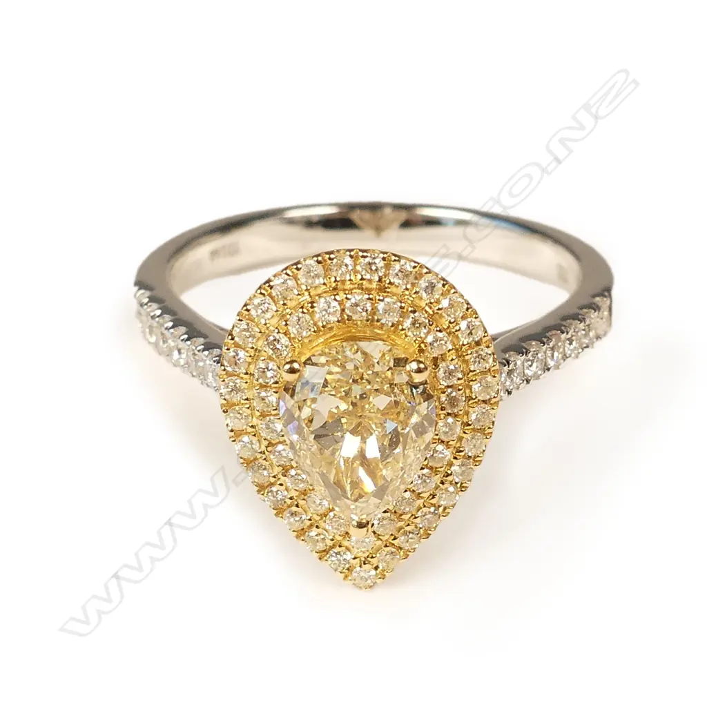 An 18ct. modern white gold multi-stone diamond set ring Image 1++