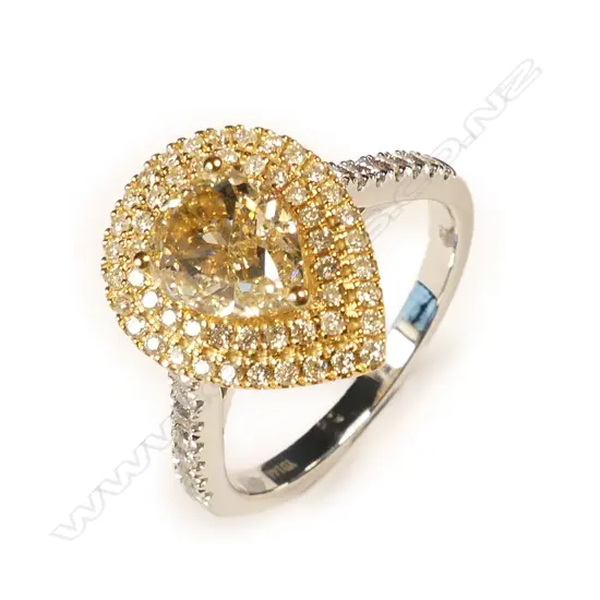 An 18ct. modern white gold multi-stone diamond set ring