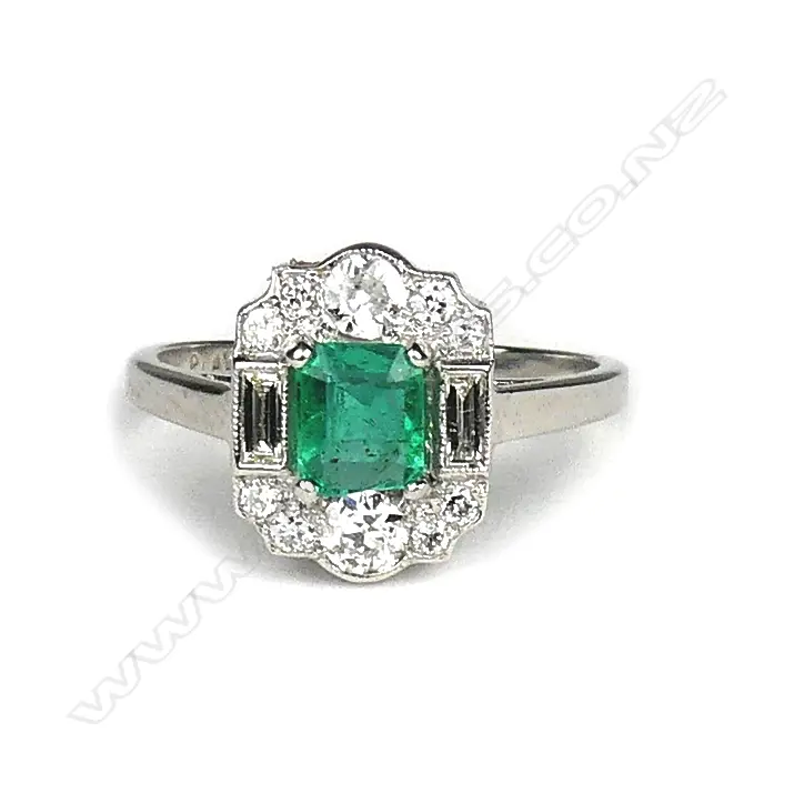 An 18ct. white gold Art Deco emerald and diamond dress ring Image 1++