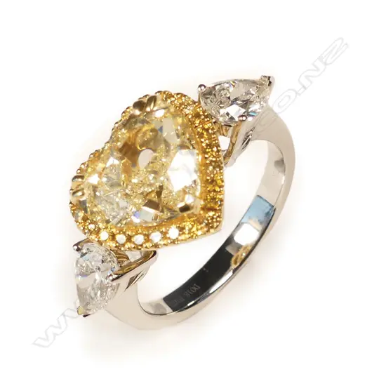 An impressive 18ct. white gold yellow and white diamond ring