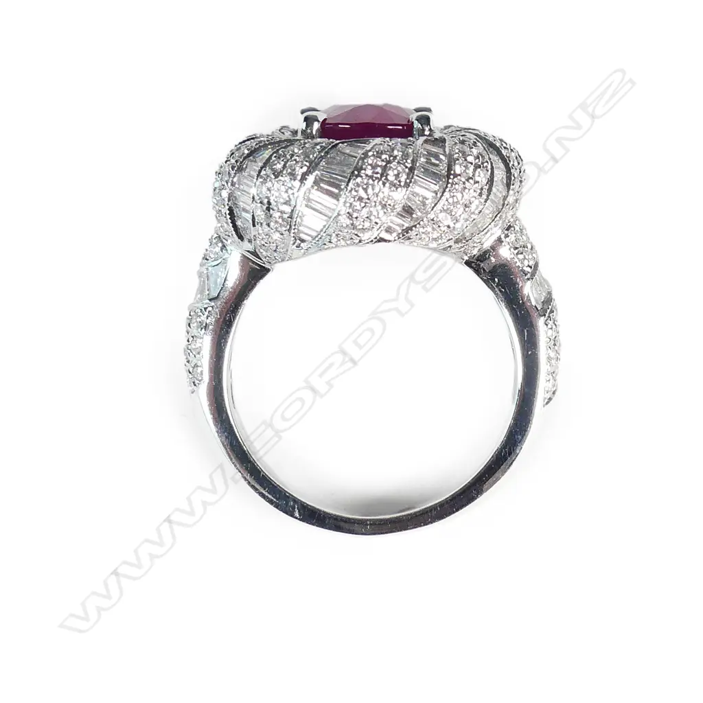 A vibrant 18ct white gold ruby and diamond dress ring Image 1++