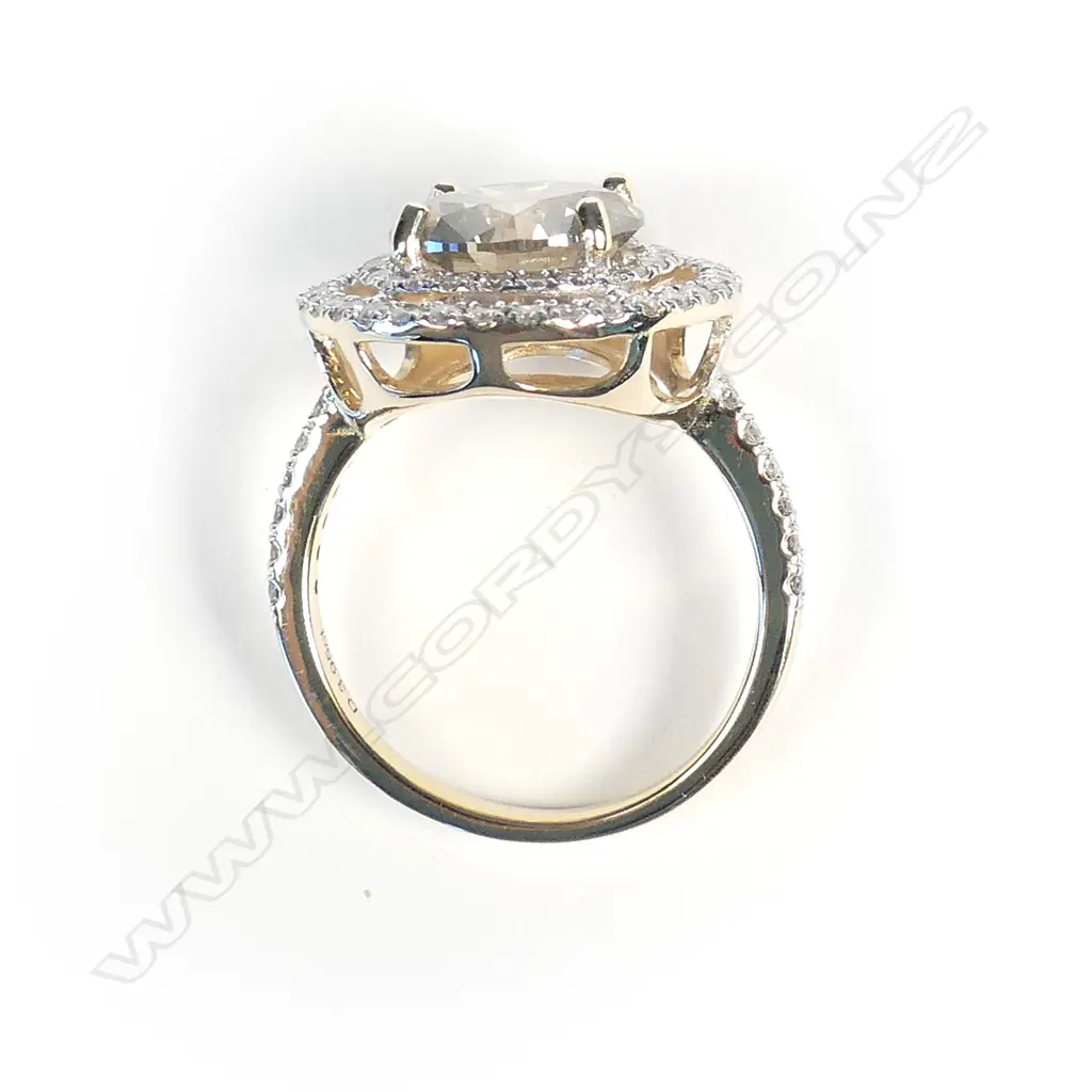 A 14ct gold and diamond ring Image 1++