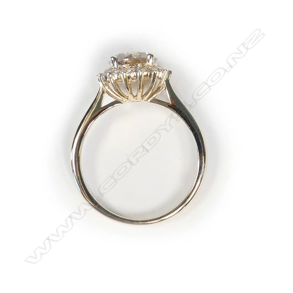 A 14ct gold and diamond ring Image 1++