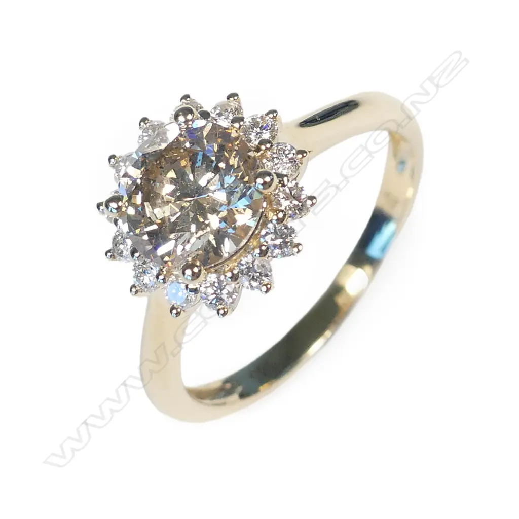 A 14ct gold and diamond ring Image 1++