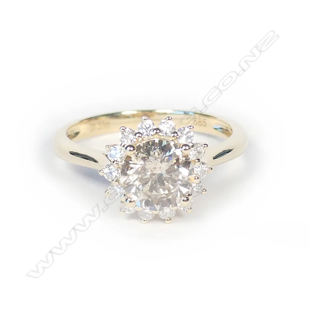 A 14ct gold and diamond ring Image 1++